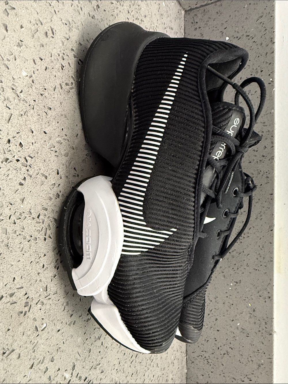 Nike Women's Black Sneakers with White Swoosh
